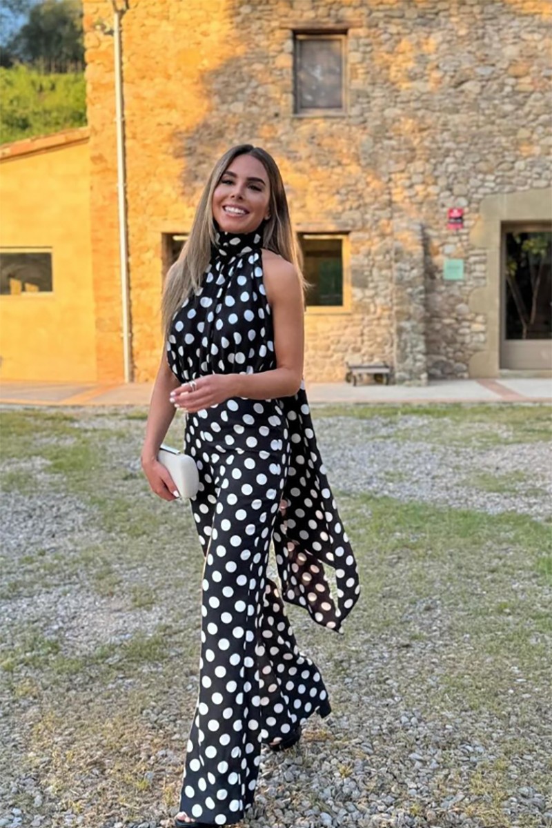 comprar online mono de vestir  en crepe saten negro con lunares blancos cuello halter y lazada pantalon palazzo para invitada a boda, bautizo, mama de comunion, fiesta